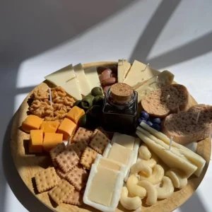 Vela decorativa en forma de tabla de quesos